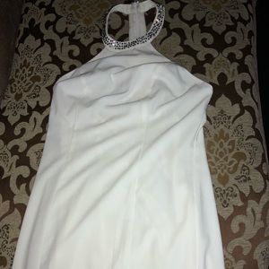 White dress with beautiful accent on neck line